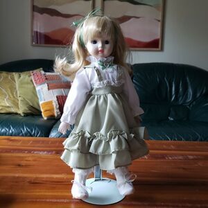 Musical porcelain doll tea for two